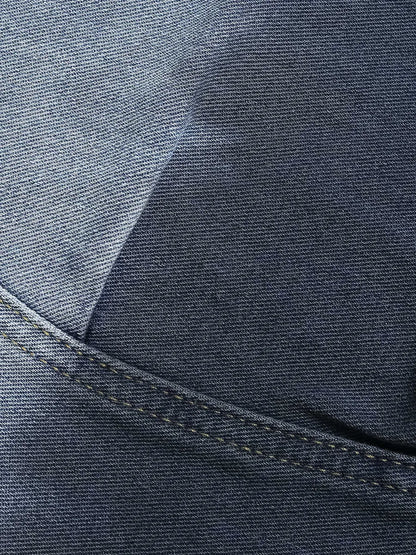 Blue women's cropped jeans with a loose fit, tie-dye gradient pattern, and distressed wash.