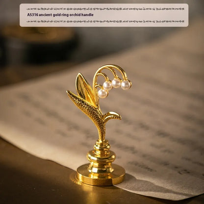 Wooden wax seal handle tool in various designs including lily, pearl cloud, and double dragon styles.