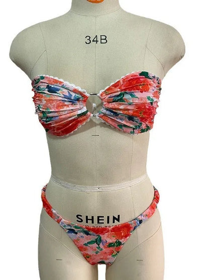 Colourful floral print tube top bikini set with lace trim on a mannequin