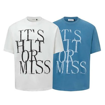 Men's loose blue t-shirt with large white letter print on the chest.