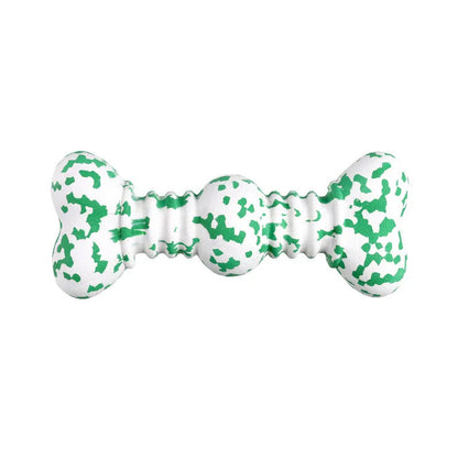 Natural rubber dog chew toy with camouflage design for aggressive chewers, USDA organic certified, in green, white, and yellow colours.