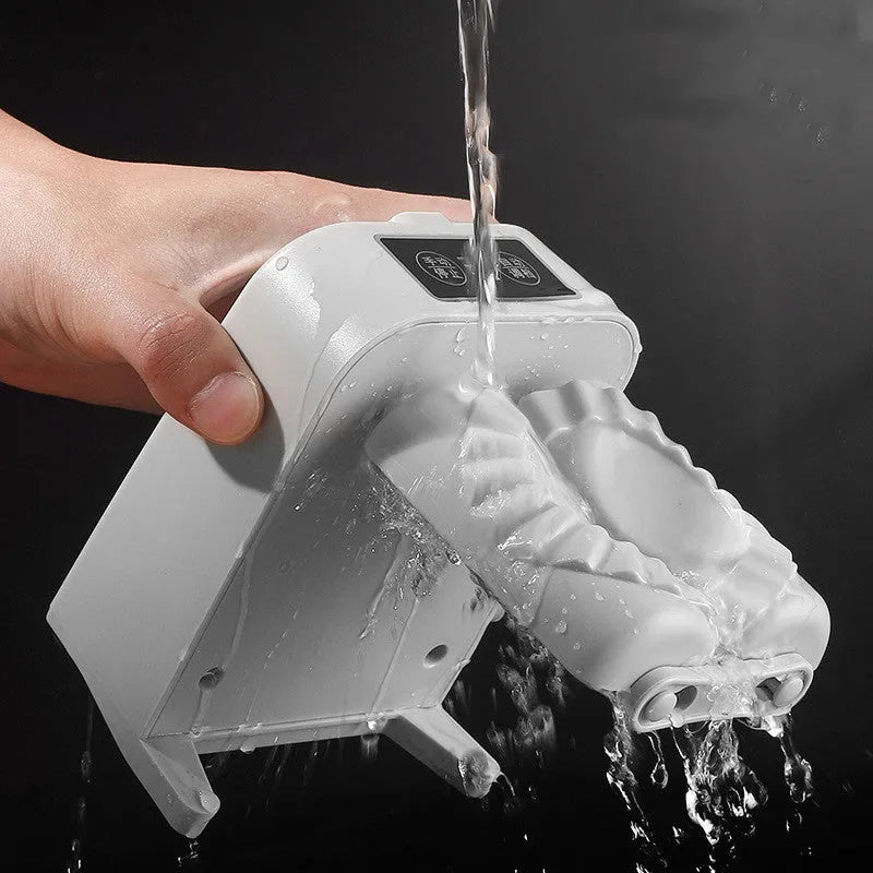 White automatic electric dumpling maker machine with USB cable, brush, and spoon.