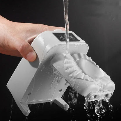 White automatic electric dumpling maker machine with USB cable, brush, and spoon.