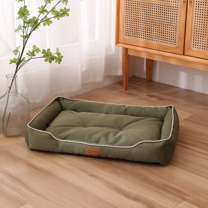 Grey waterproof Oxford cloth dog sofa bed on a wooden floor