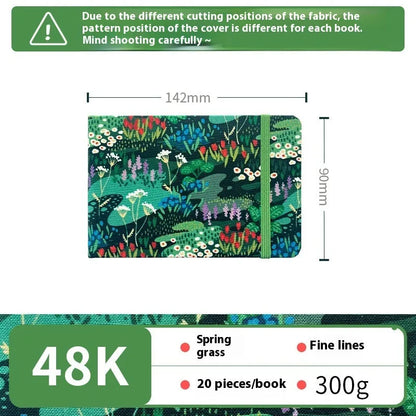 Feiluniao watercolour notebook with fabric cover, 185mm length, open to show paper for painting.
