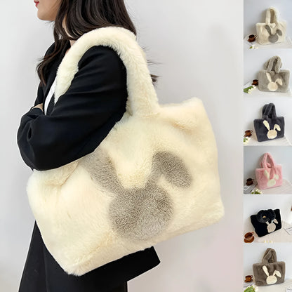 Cute cartoon rabbit ears design on a soft plush large capacity shoulder tote bag.