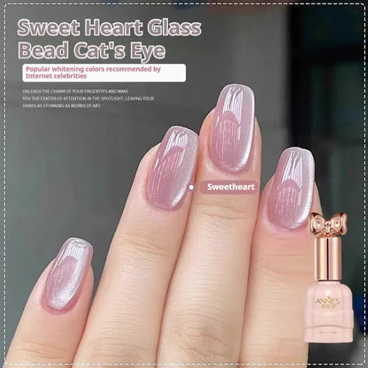 Bottle of micro glass bead cat's eye gel nail polish for magnetic nail art.