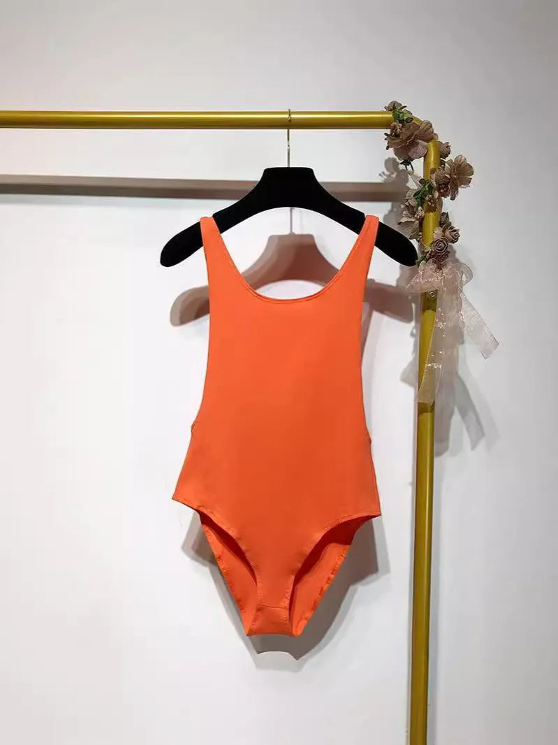 Backless sling jumpsuit for women, slim fit polyester, short 40cm length, black white khaki orange, sizes S M L