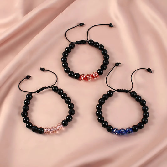 Adjustable bracelet with luminous geometric glass beads in six colour options on a wrist