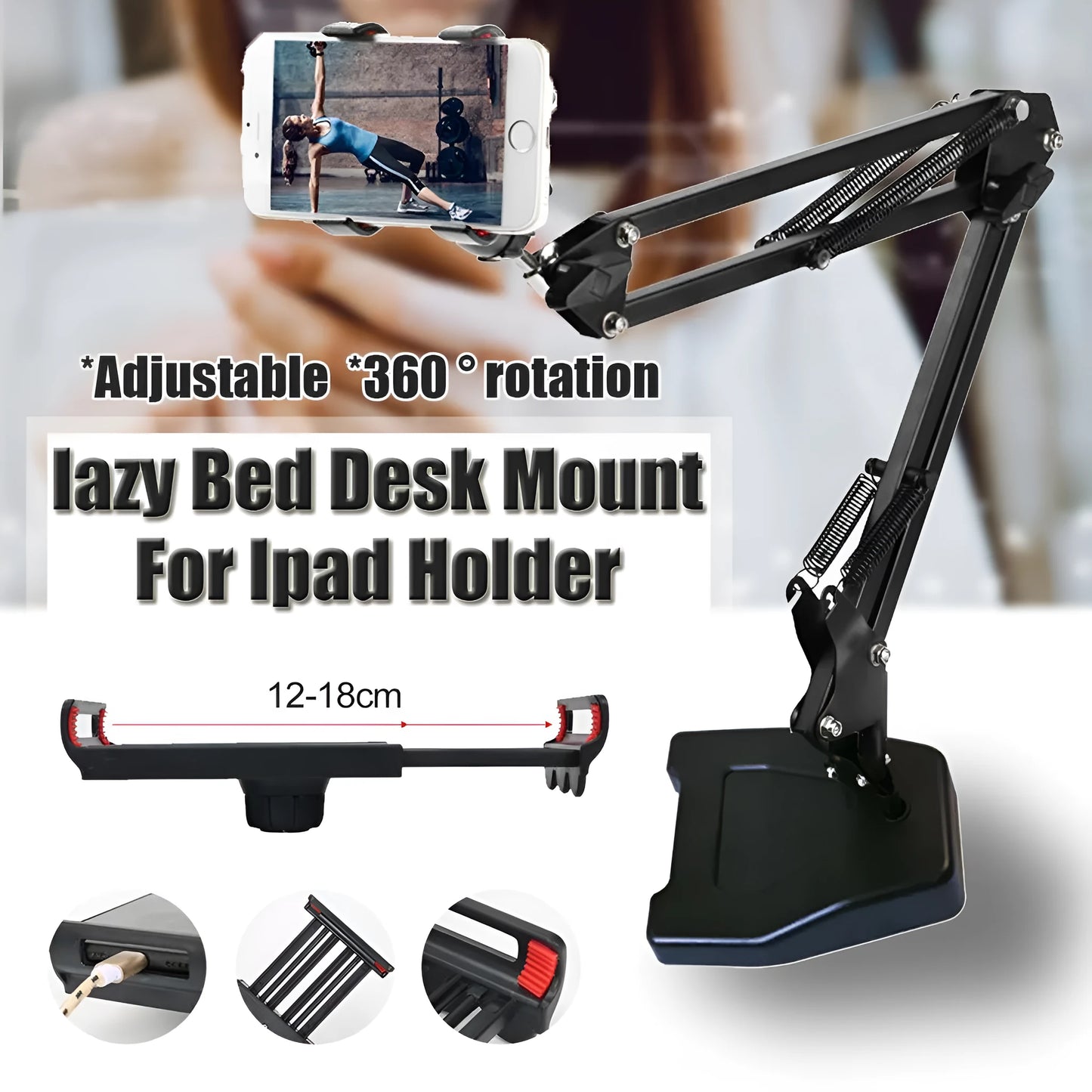 Black universal phone stand with long metal arm and heavy round base on a wooden desk