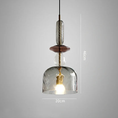 Glass chandelier with adjustable height above bar counter showing macaron-inspired candy glass design