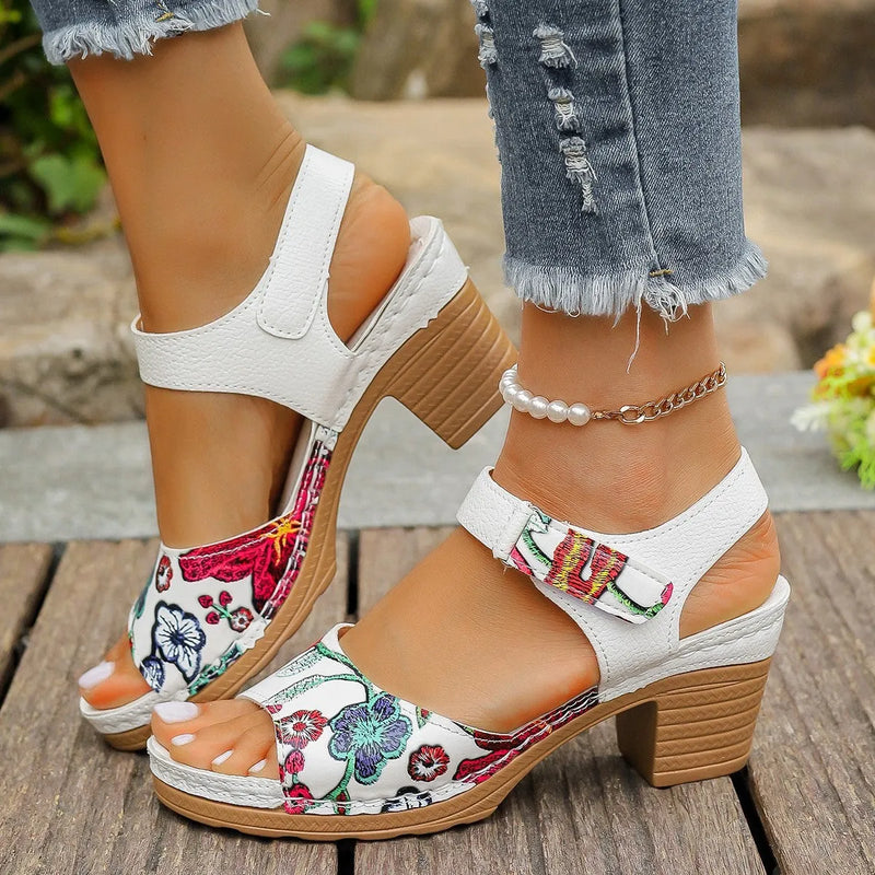 Women's casual high heel sandals with adjustable velcro buckle fastening in classic white colour, available in sizes EU 36 to 43 with synthetic PU upper and durable rubber sole material