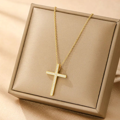 Women's gold electroplated copper necklace showing four pendant options: heart, butterfly, cross and round diamond