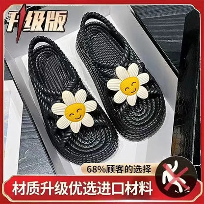 Women's beige PVC sandals with a sunflower pattern and round toe on a non-slip sole.
