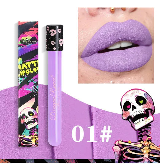 Halloween skull test tube lip gloss in gold and silver matte metallic shades showing doe-foot applicator.
