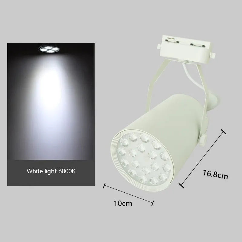 LED track spotlight with aluminium shell in black or white finish, mounted on a lighting track.