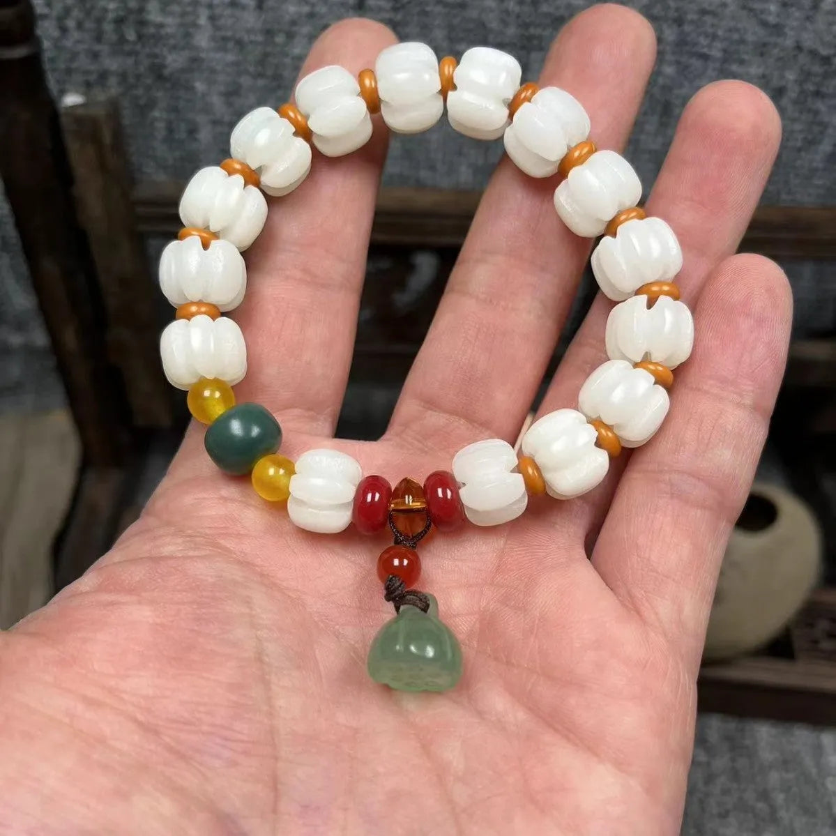 White Bodhi root bracelet with carved pumpkin lotus beads including Apple Orchard and Duobao styles