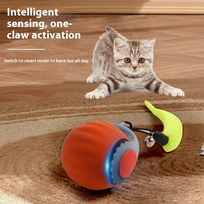 Automatic gravity sudden ball cat toy in orange and blue, made from durable silicone