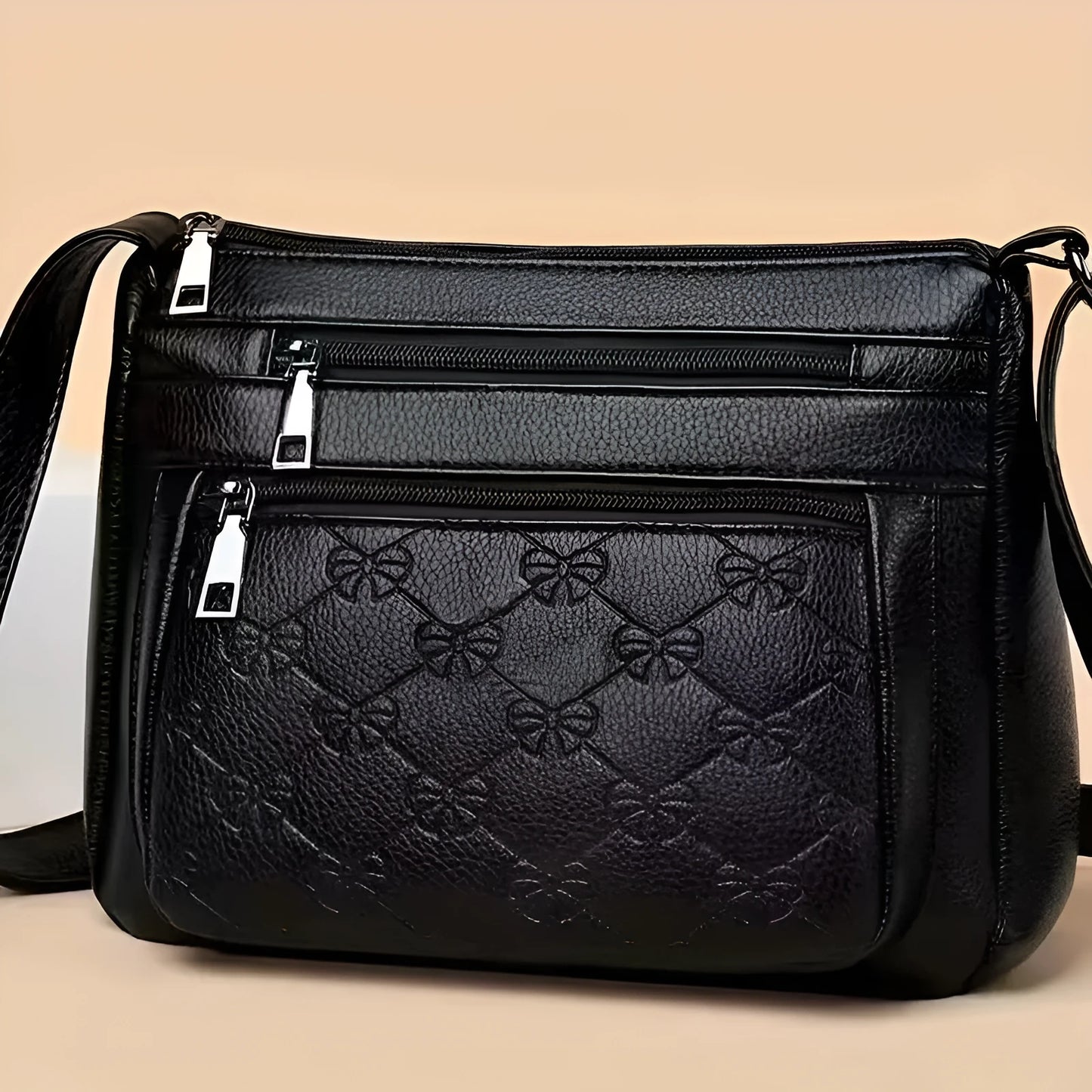 Butterfly black women's crossbody bag with horizontal square shape and embossed pattern
