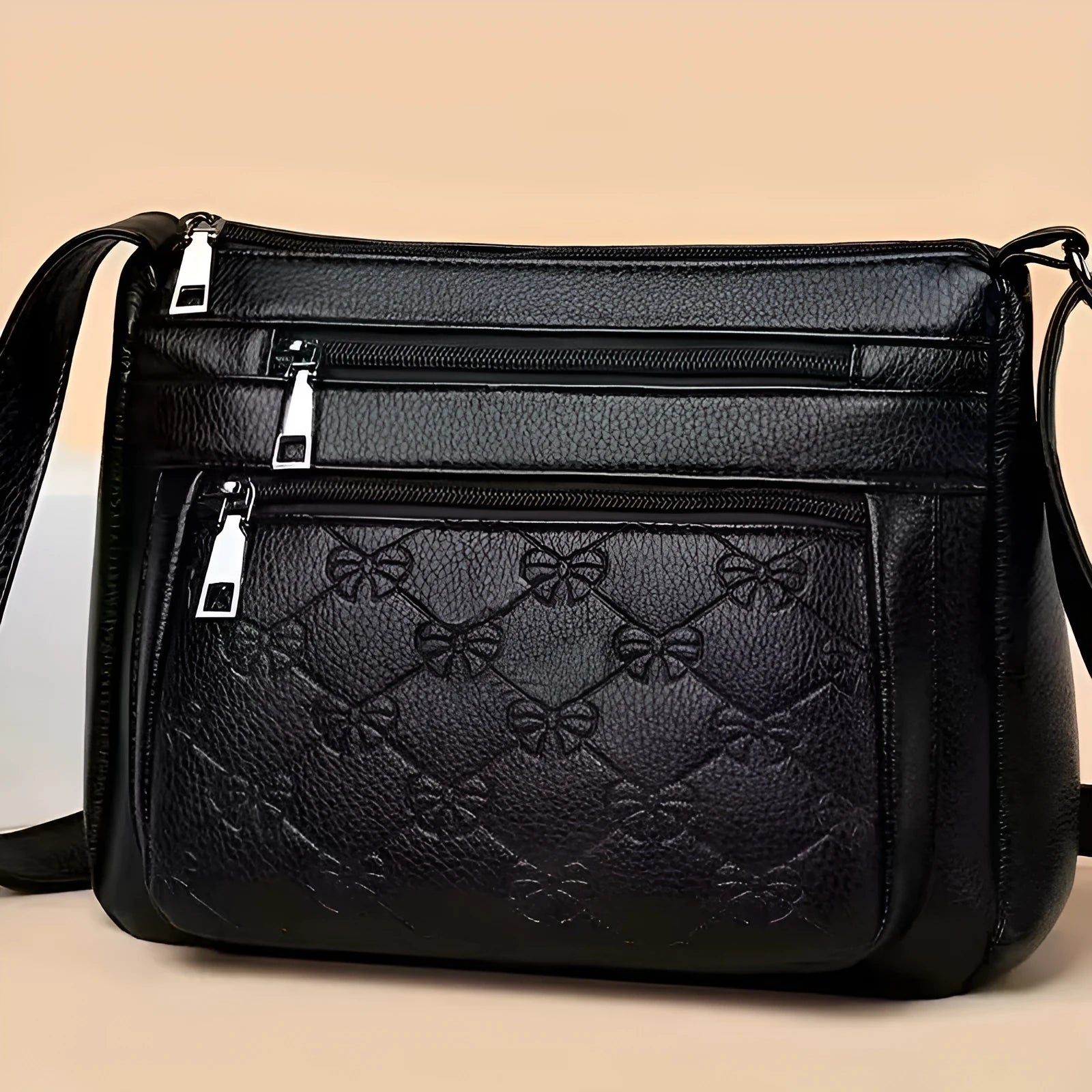 Butterfly black women's crossbody bag with horizontal square shape and embossed pattern