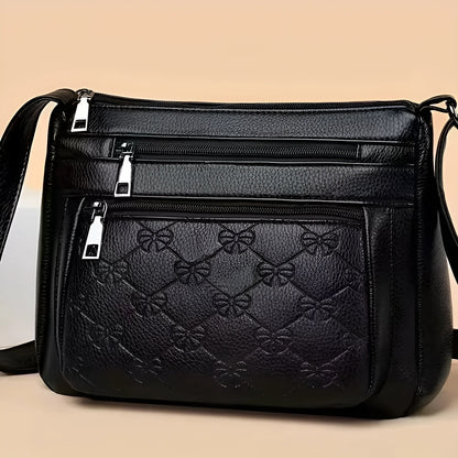 Butterfly black women's crossbody bag with horizontal square shape and embossed pattern