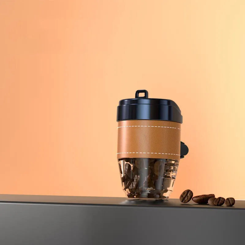 Brown plastic coffee cup-shaped solid car air freshener for dashboard odour removal.