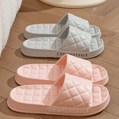 Plush flannel house slippers with soft EVA soles for quiet, cushioned indoor wear in a variety of vibrant colors