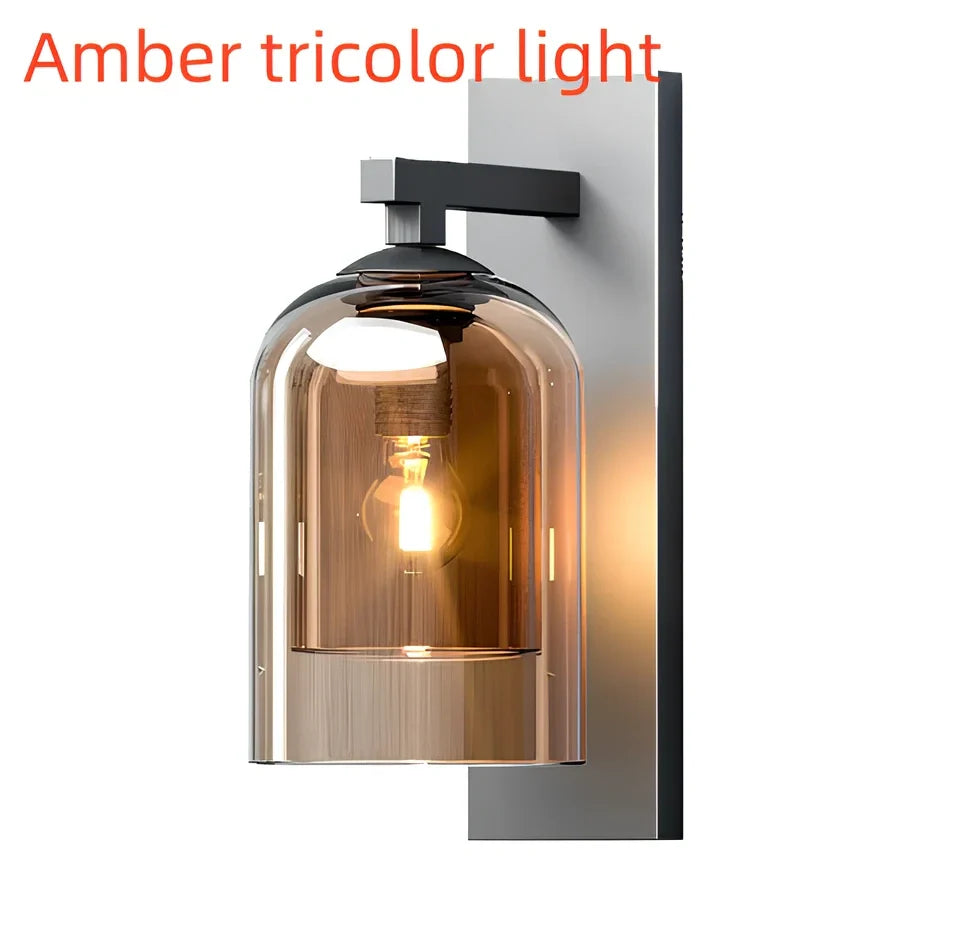 Nordic wall lamp with glass shade in amber colour, E27 holder, and compact 15 mm dimensions for wall mounting.