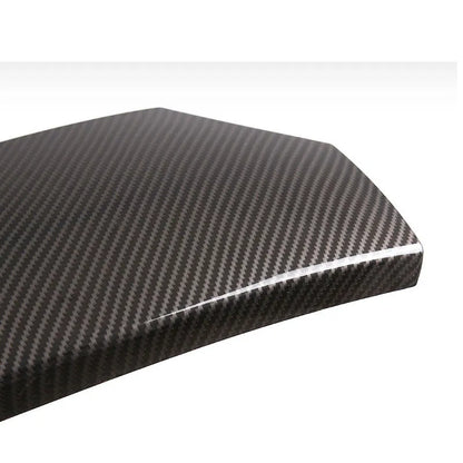Set of three black ABS plastic armrest box covers with a shiny carbon fibre weave pattern.