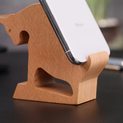 Beech wood mobile phone holder with coin slot showing adjustable angle and resin decorative elements