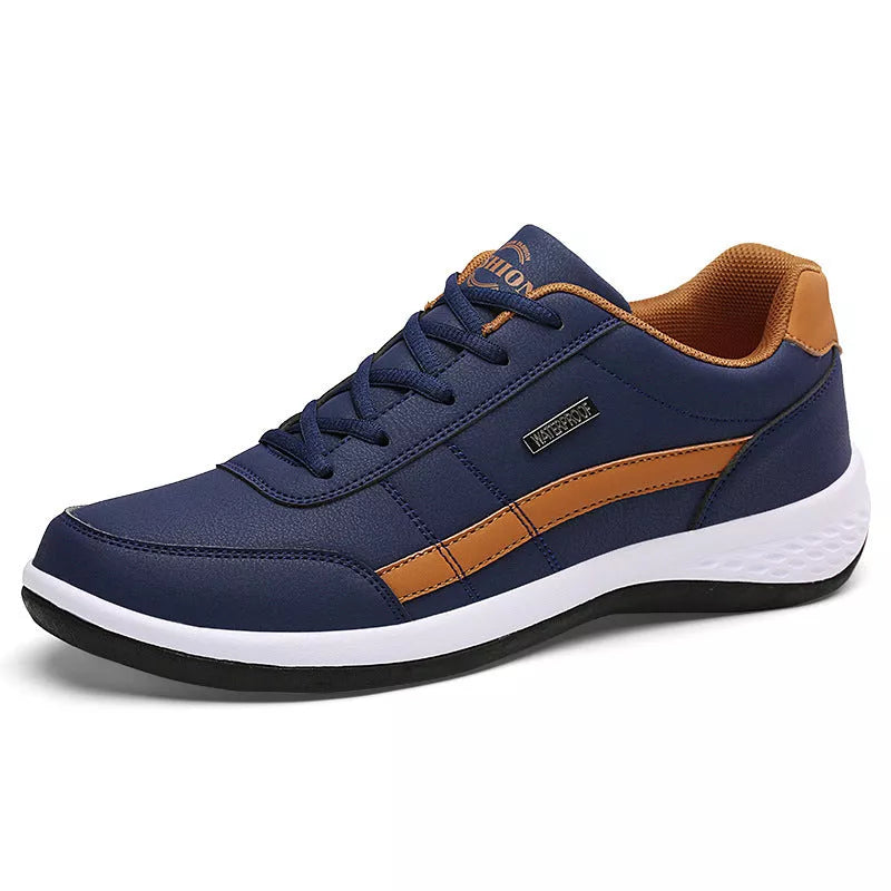 Round toe non-slip sports sneakers in black, blue, and white with breathable mesh design