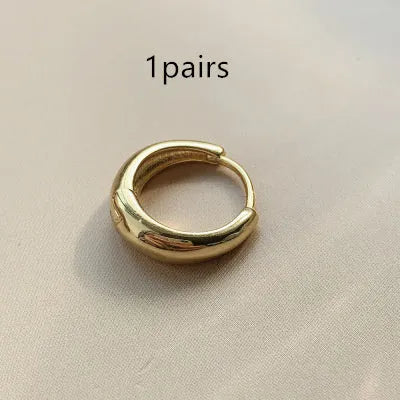 Women's retro minimalist water drop earrings in geometric round shape available in gold or silver colour with three size options