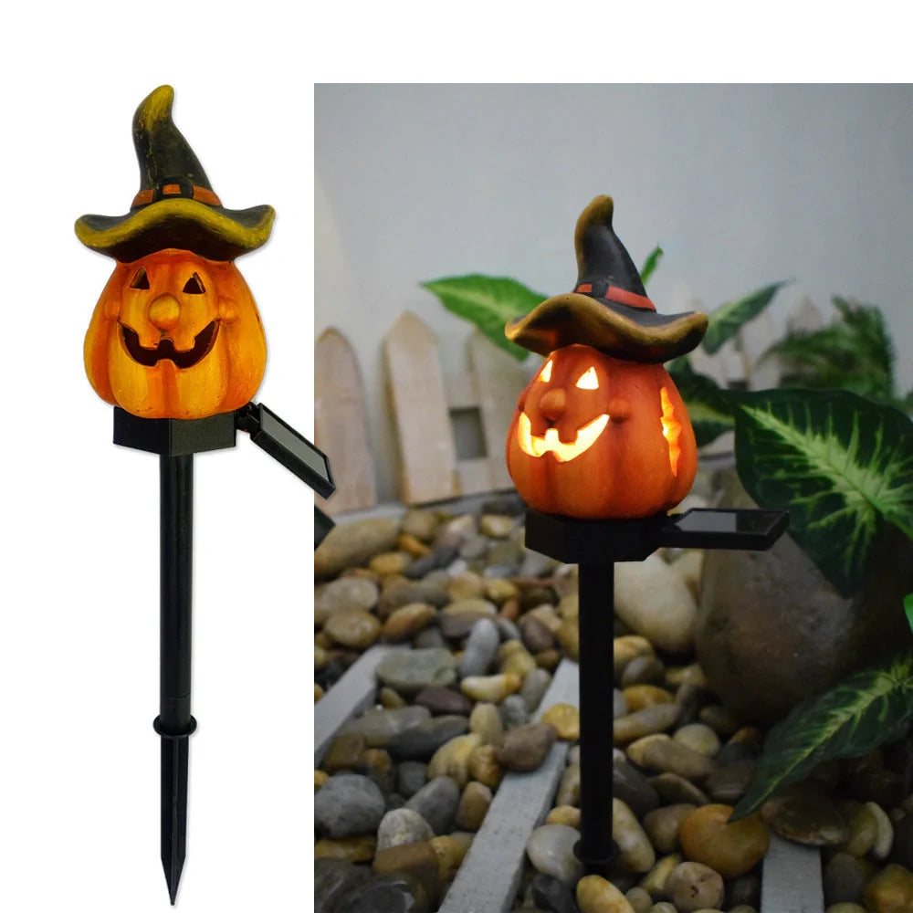 Solar-powered Halloween pumpkin lanterns lighting up a garden at night