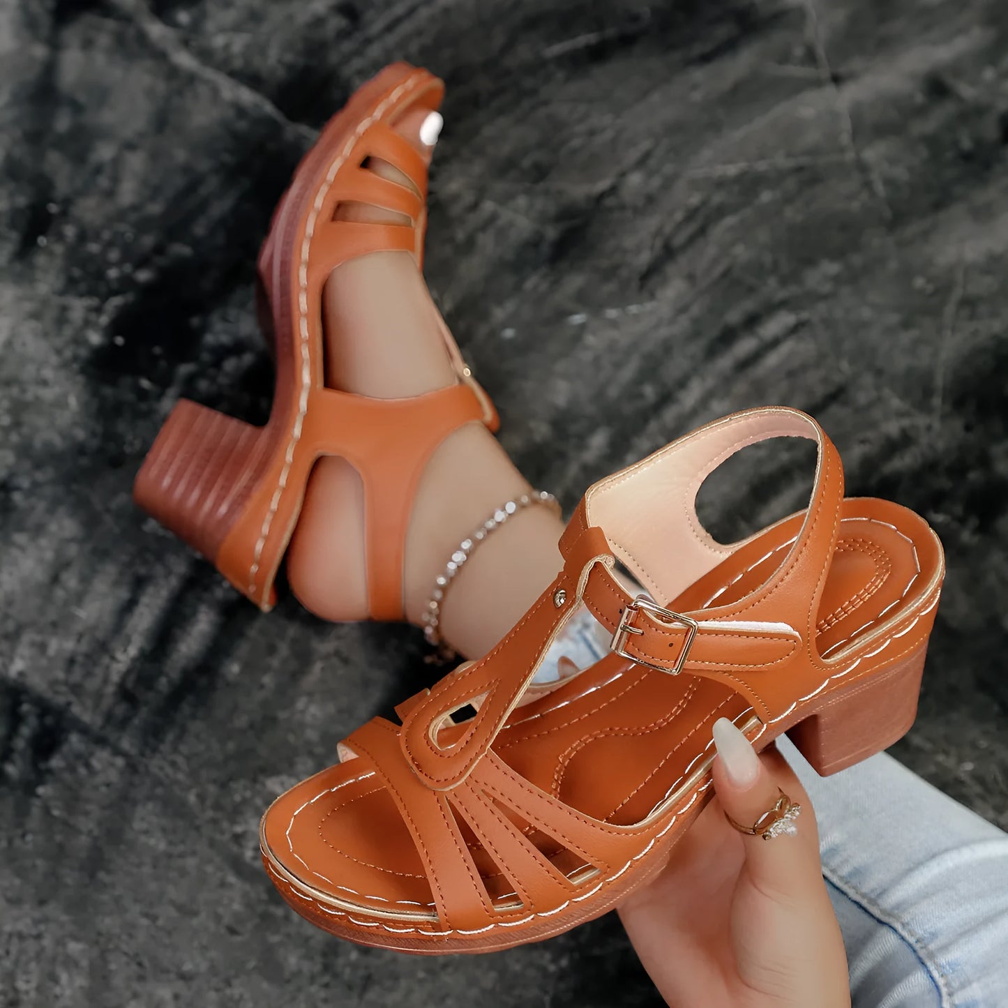 Women's black peep toe wedge platform sandals showing fish mouth toe design and ankle buckle strap