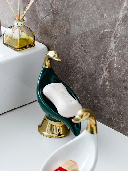 Ceramic swan soap rack in white and green with drainage cover