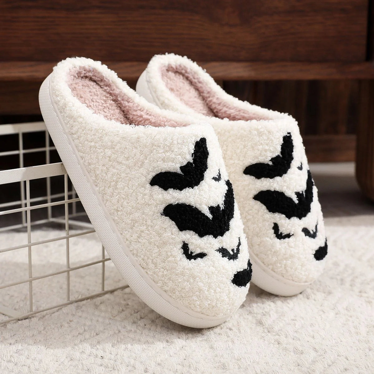 Halloween bat design plush slippers for indoor wear, available in white and black