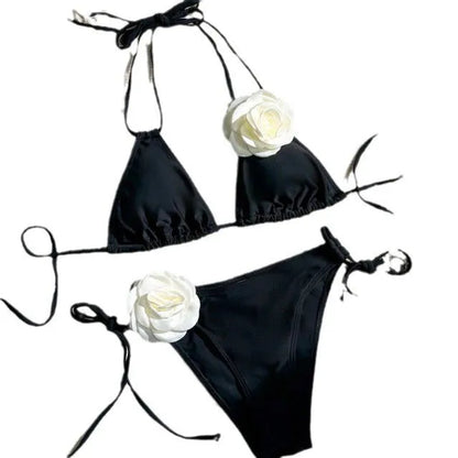 Black women's bikini set with 3D flower lace detailing and an adjustable drawstring waist.