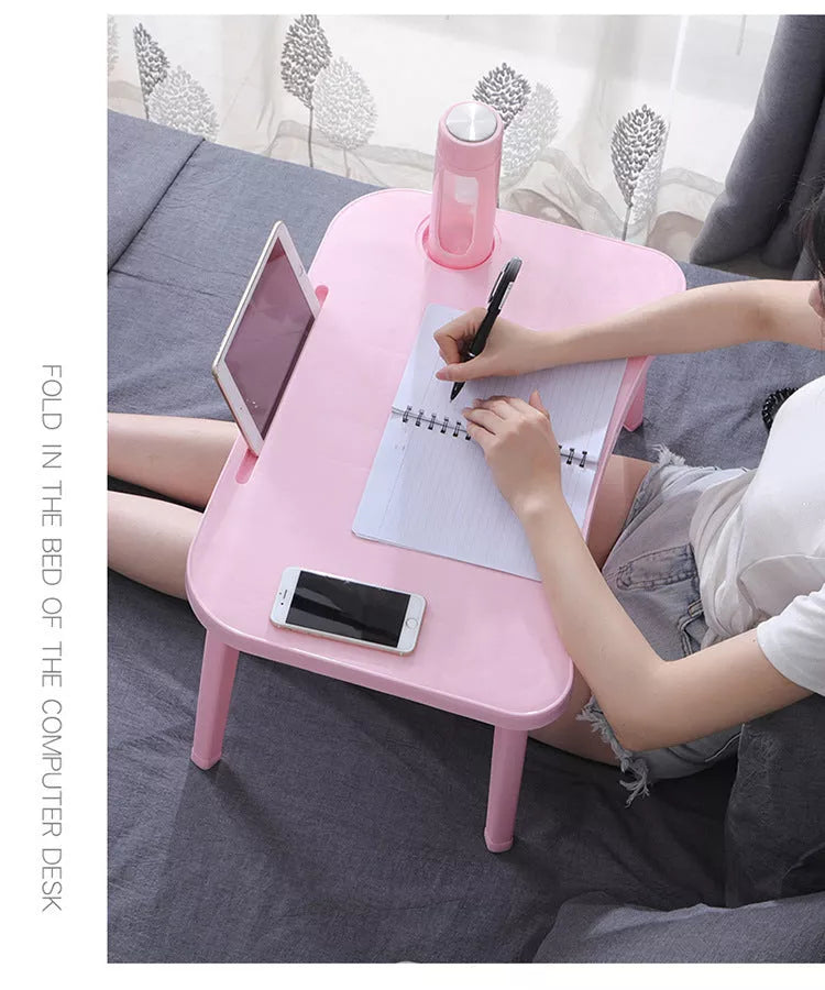 Foldable bed table in Nordic colors for portable computing