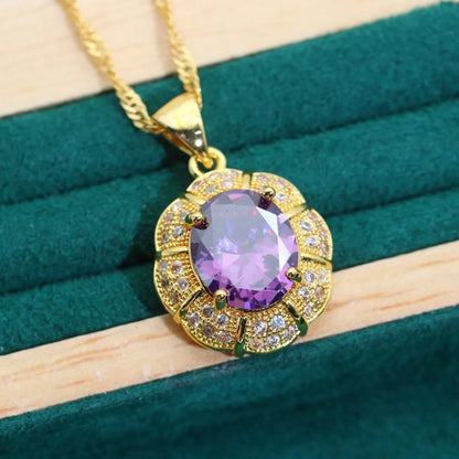18k gold plated jewellery set with multi-colour synthetic cubic zirconia stones, including necklace, earrings, ring, and bracelet