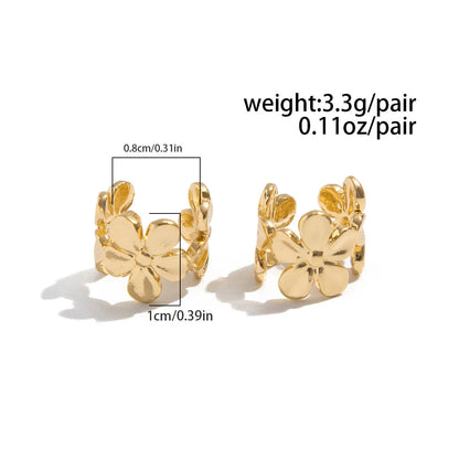 Gold electroplated alloy earrings with starfish and conch design elements for women's beach fashion