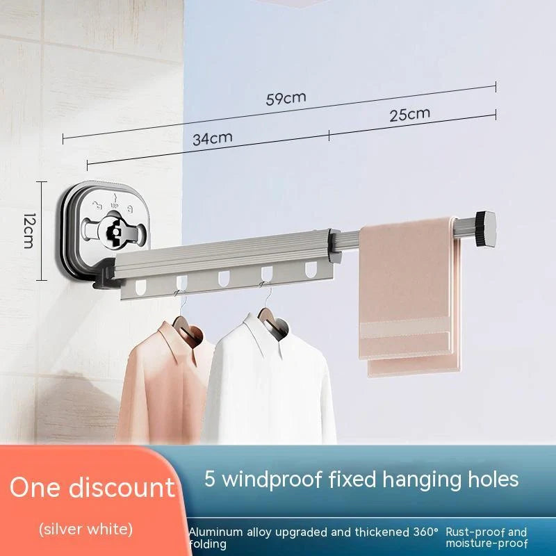 Aluminum retractable drying rack mounted on a window, extending outward for clothes drying