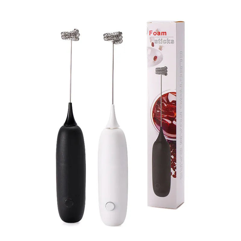 Hand-held electric milk frother in black or white colour, modern design for frothing and blending beverages