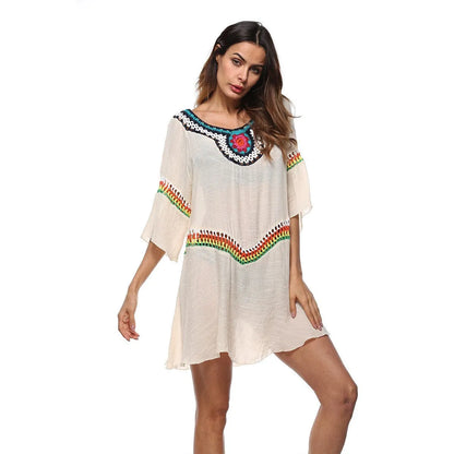 Women's crocheted ethnic style beach cover-up top in apricot colour, for sun protection.