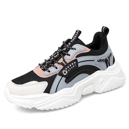 Women's white casual sports shoes with mesh upper, thick sole, buckle strap, and round toe.
