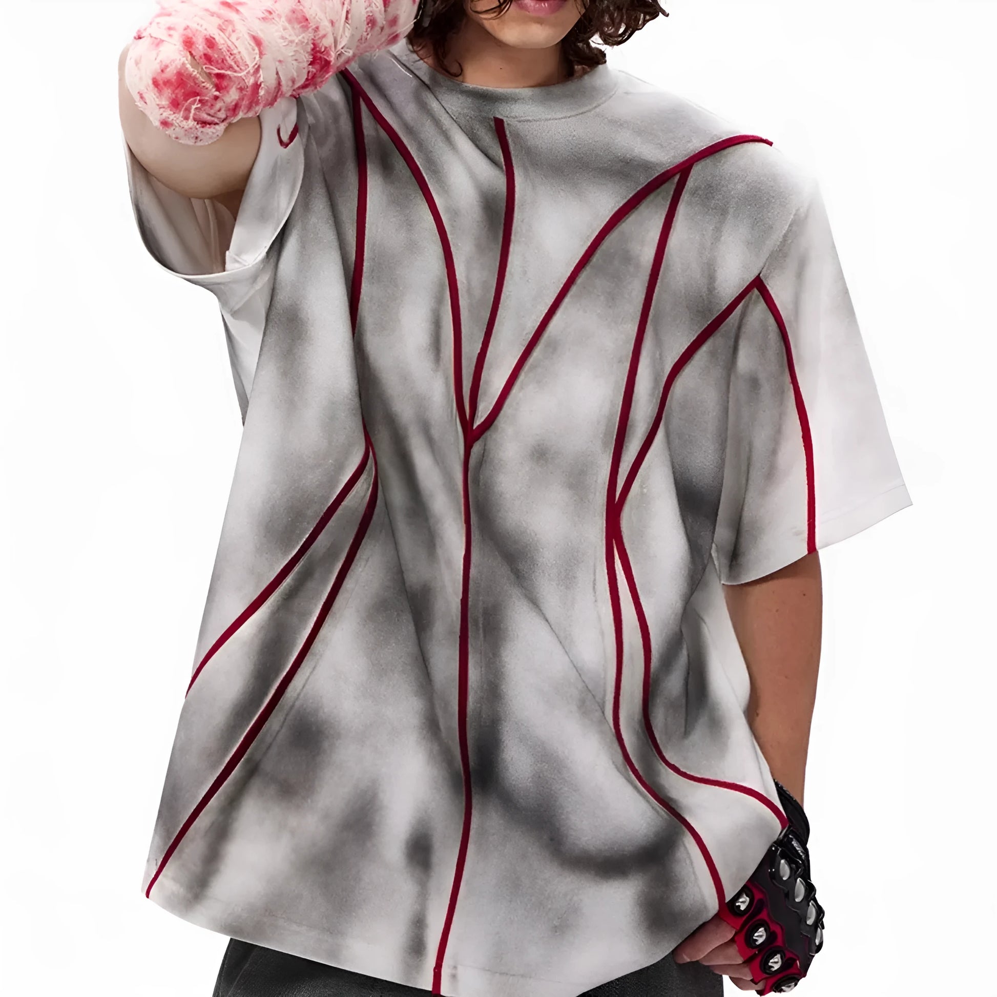 Padded shoulder short sleeve t-shirt with raised 3D line patchwork detailing on the front.