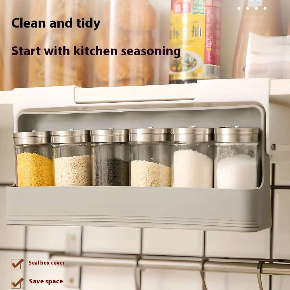 Gray kitchen storage rack with six seasoning bottles mounted on wall using punch-free adhesive system