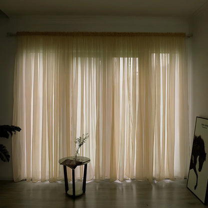 Simple modern balcony solid colour gauze curtain in beige showing light transmission effect