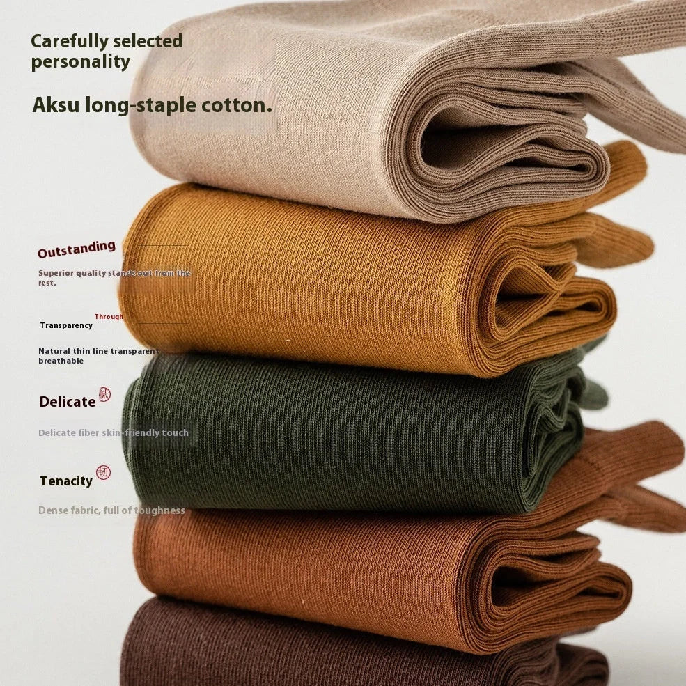 Mid-calf business socks in solid colours with combed cotton construction and deodorant function