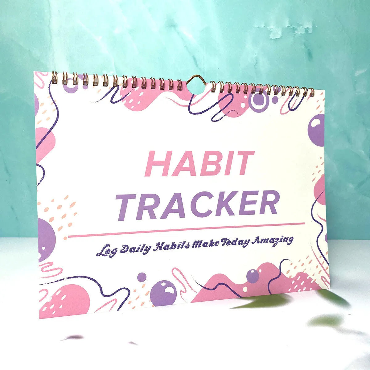Habit tracking planning book in A4 size with multiple colour options