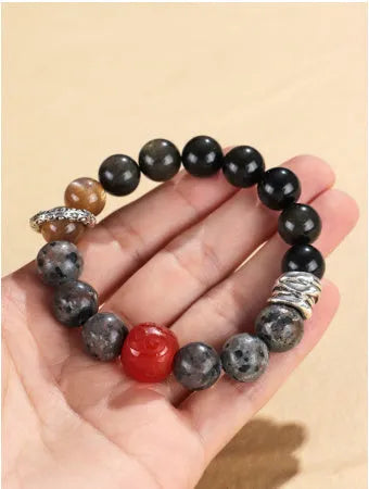 Gold obsidian, flame stone and red agate beads on unisex bracelet with manual processing